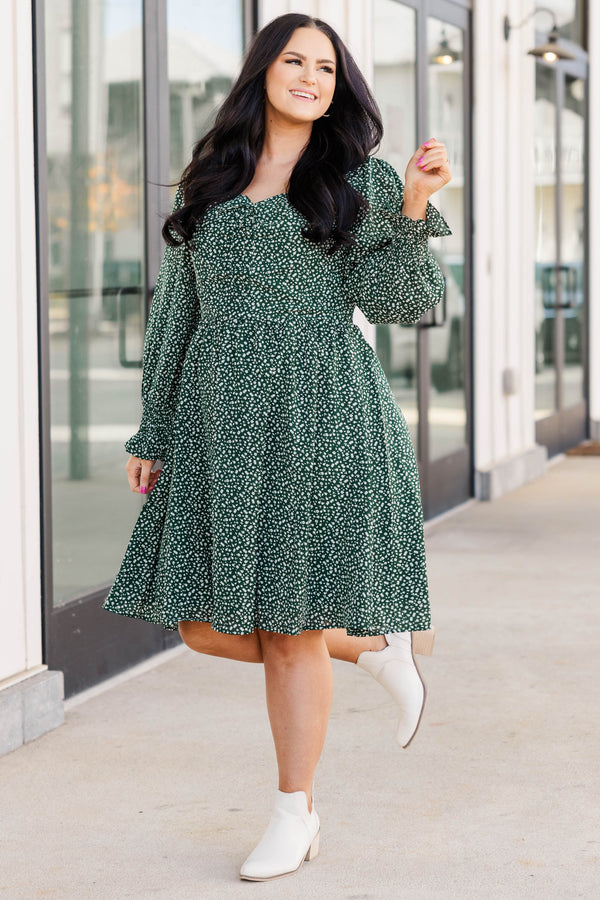Chic Soul plus size clothing, hunter green long sleeve dress with white floral pattern, smocked material in the back with a vintage neckline
