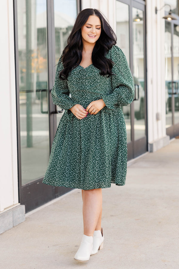 Chic Soul plus size clothing, hunter green long sleeve dress with white floral pattern, smocked material in the back with a vintage neckline