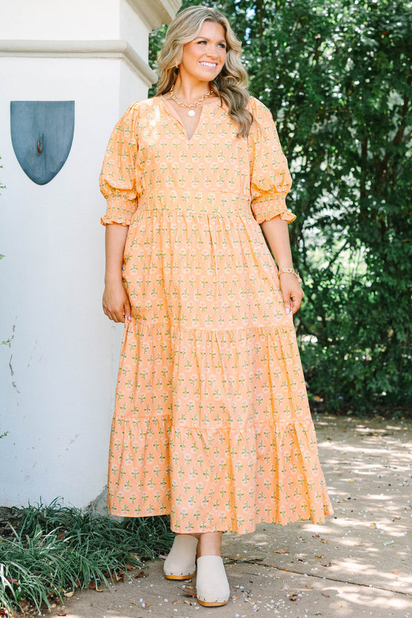 Plus Size rust floral tiered maxi dress with a v-neck, smocked puff sleeves, and a flowy fit.