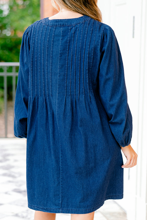 Chic Soul plus size clothing, blue denim long sleeve dress with a v-neckline and a bow detail on the center of the neckline 