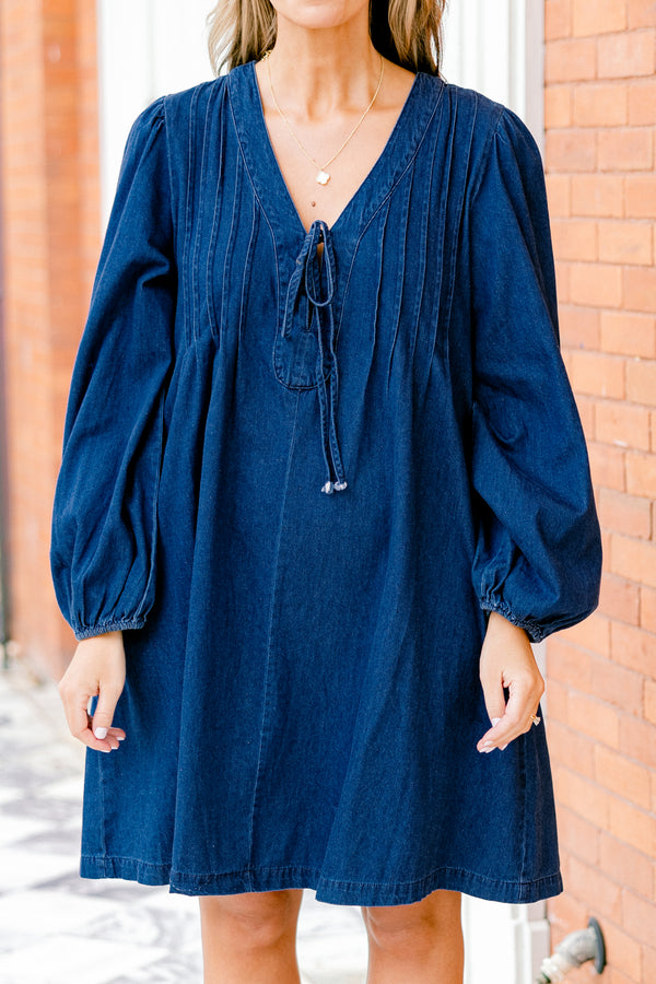 Chic Soul plus size clothing, blue denim long sleeve dress with a v-neckline and a bow detail on the center of the neckline 