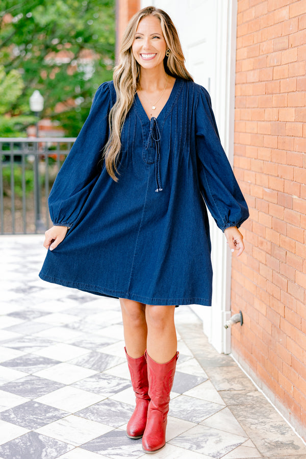 Chic Soul plus size clothing, blue denim long sleeve dress with a v-neckline and a bow detail on the center of the neckline 