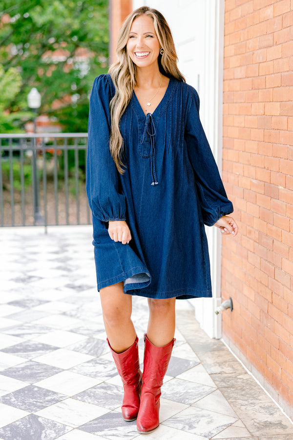 Chic Soul plus size clothing, blue denim long sleeve dress with a v-neckline and a bow detail on the center of the neckline 