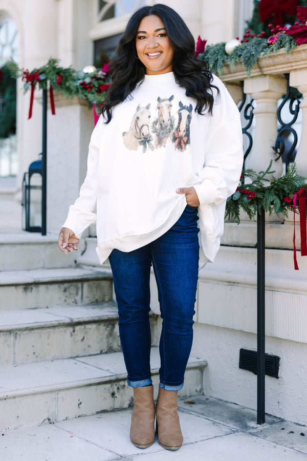 Plus Size ivory mock neck pullover featuring a graphic of three horses with festive holiday bows.