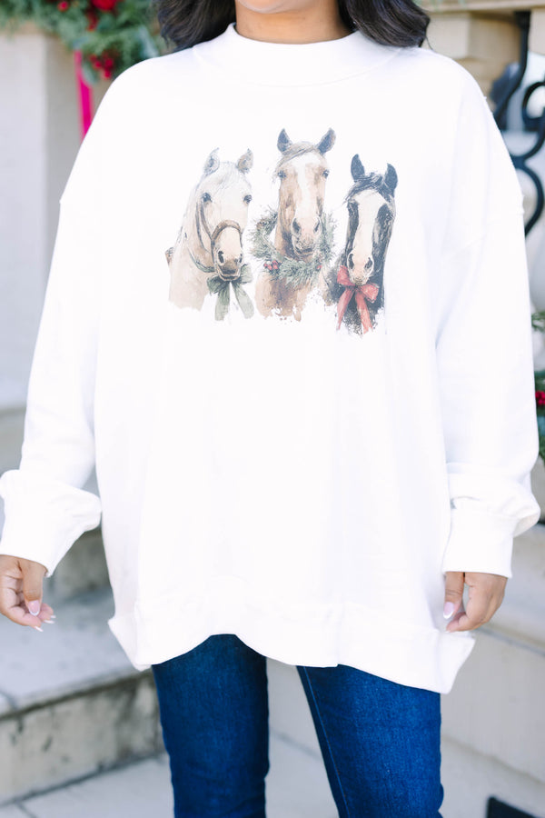 Plus Size ivory mock neck pullover featuring a graphic of three horses with festive holiday bows.