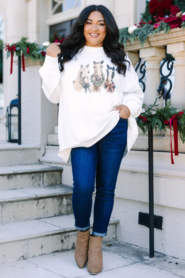 Plus Size ivory mock neck pullover featuring a graphic of three horses with festive holiday bows.