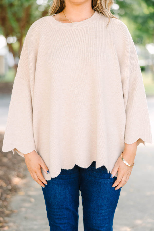 Plus Size taupe oversized knit sweater with a crew neckline, wide sleeves, and a scalloped hem.