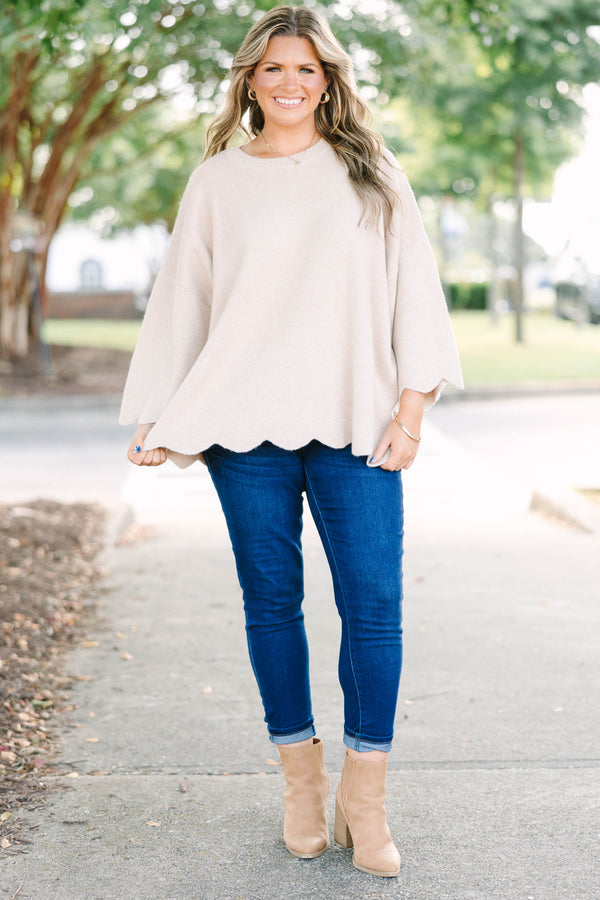 Plus Size taupe oversized knit sweater with a crew neckline, wide sleeves, and a scalloped hem.