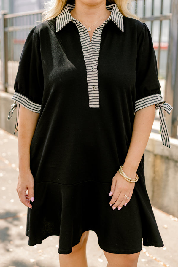 Chic Soul plus size clothing, black short sleeve v neckline dress with white and thin black horizontal stripes lining the neckline and the sleeves, tying them in a bow