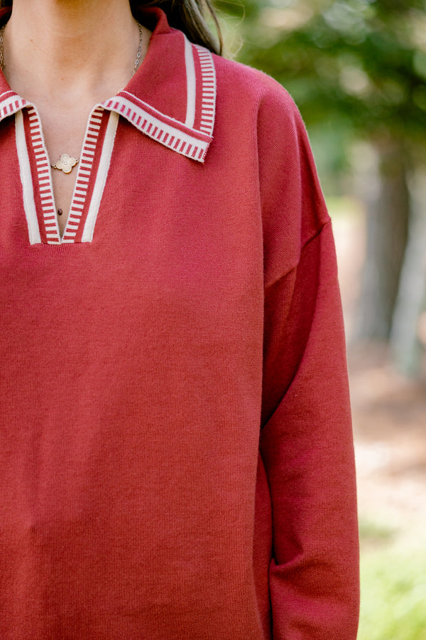 Chic Soul plus size clothing, rust red long sleeve v-neck sweater with collar with white stitching details around the collar, neckline, hem, and sleeves