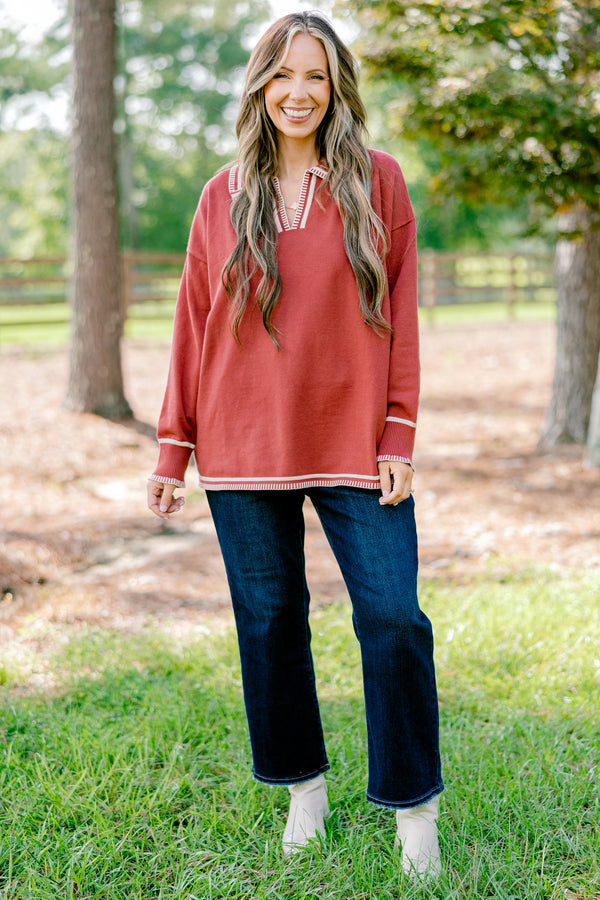 Chic Soul plus size clothing, rust red long sleeve v-neck sweater with collar with white stitching details around the collar, neckline, hem, and sleeves