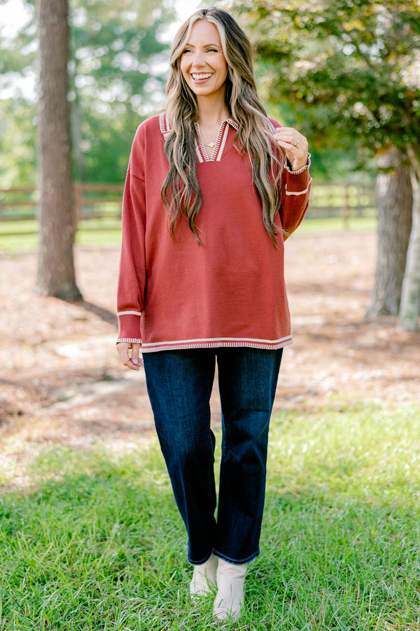 Chic Soul plus size clothing, rust red long sleeve v-neck sweater with collar with white stitching details around the collar, neckline, hem, and sleeves