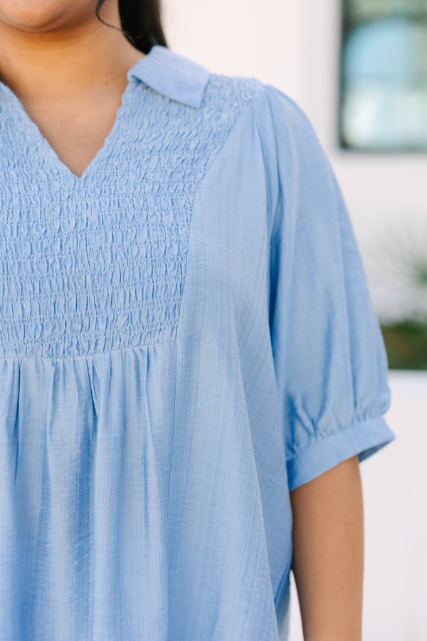 Chic Soul plus size clothing , light blue short sleeve top with rouching texturing on the chest and a collar 