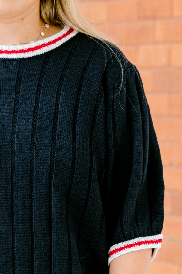 Chic Soul plus  size clothing, Navy short sleeve sweater top with a white cuff that has a ride stripe on the bottom of the shirt along the neckline and on the end of the sleeves 