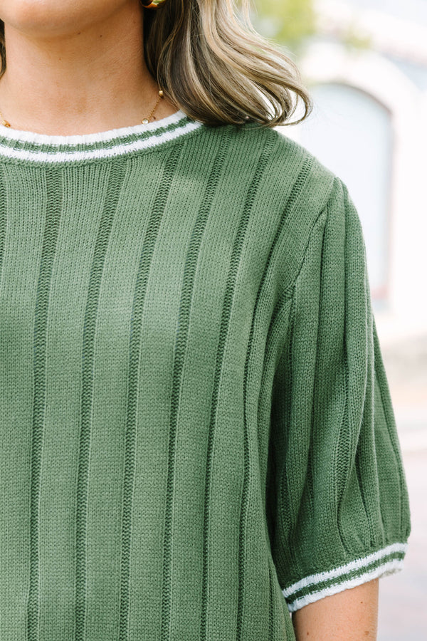 Plus Size olive green ribbed knit sweater top with white striped trim on the neck, sleeves and hem.