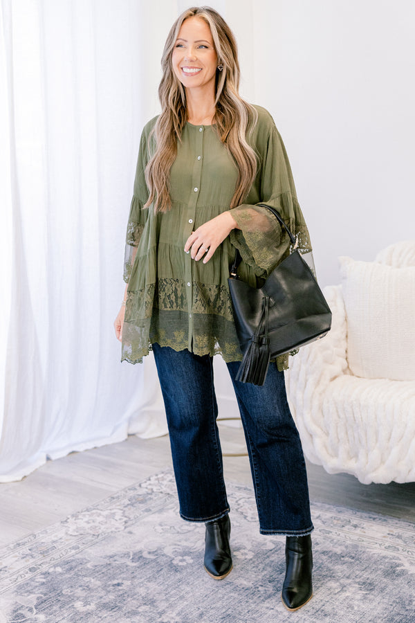 Chic Soul plus size clothing, olive long sleeve blouse with sheer lace details on the bottom of the shirt as well as at the end of each sleeve and buttons going down the middle of the top 