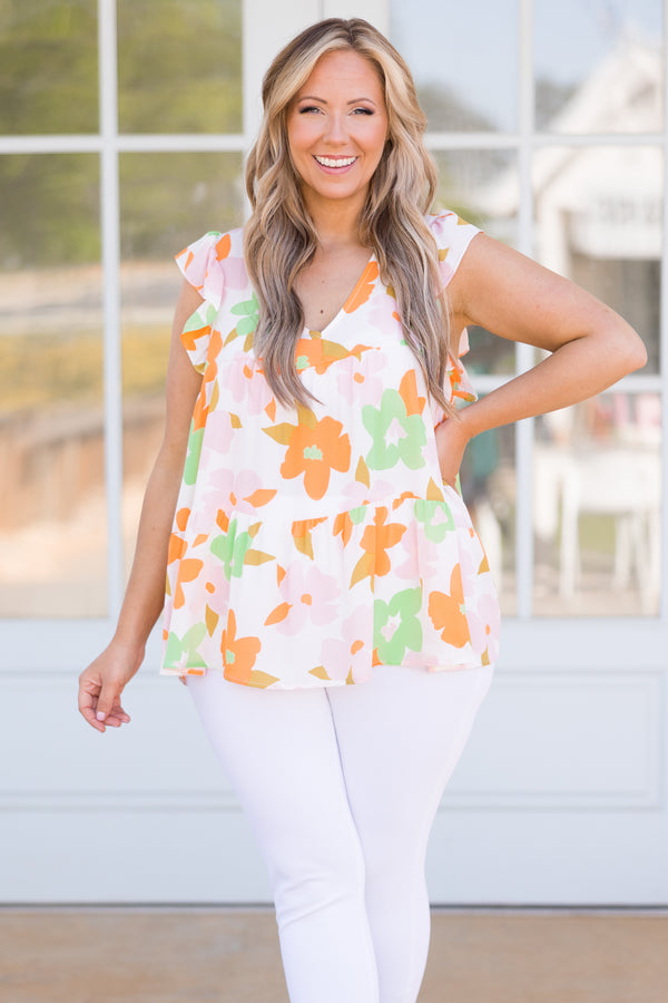 Chic Soul plus size clothing, ivory top with multicolor floral pattern and flutter sleeves