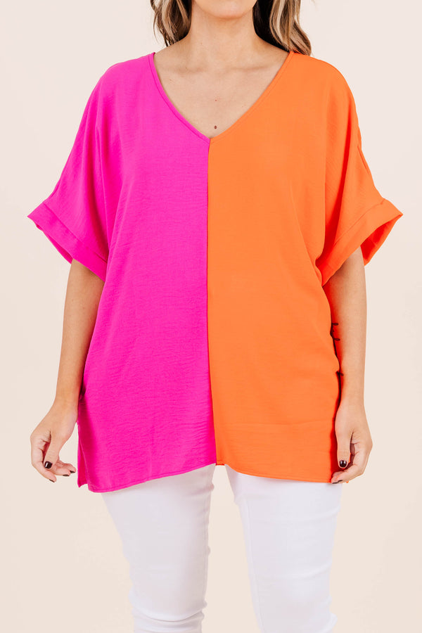 Chic Soul plus size clothing, v neck short sleeve top with orange on one side and hot pink on the other with cuff sleeves