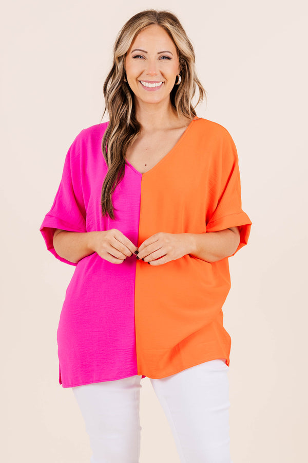 Chic Soul plus size clothing, v neck short sleeve top with orange on one side and hot pink on the other with cuff sleeves