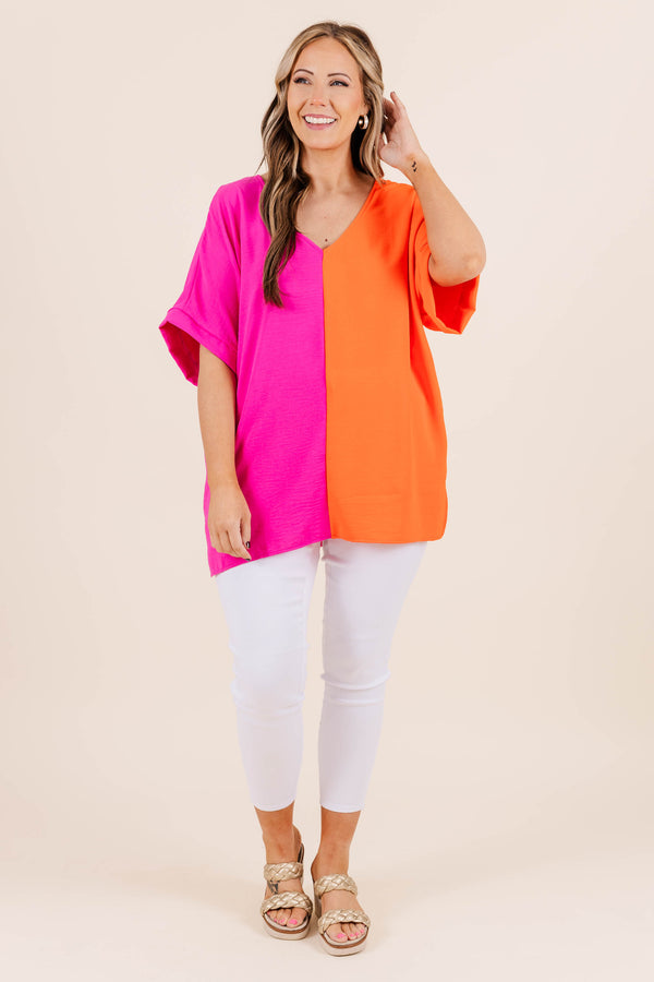 Chic Soul plus size clothing, v neck short sleeve top with orange on one side and hot pink on the other with cuff sleeves