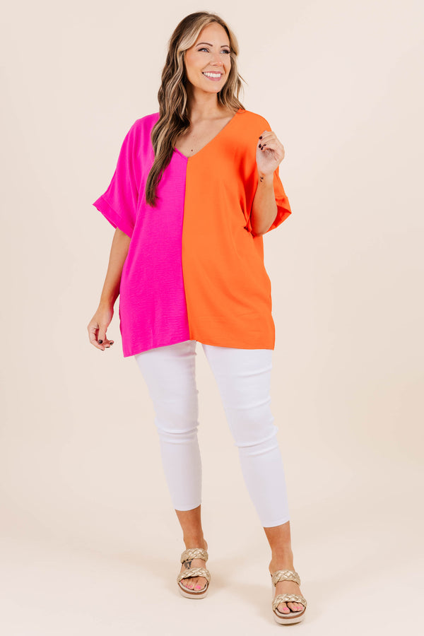 Chic Soul plus size clothing, v neck short sleeve top with orange on one side and hot pink on the other with cuff sleeves