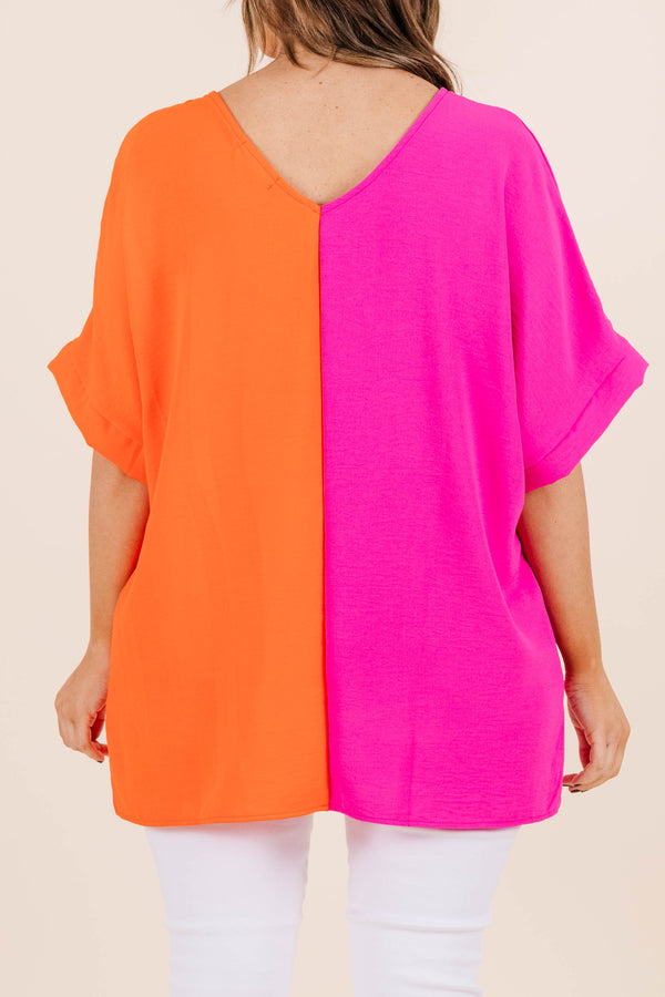 Chic Soul plus size clothing, v neck short sleeve top with orange on one side and hot pink on the other with cuff sleeves