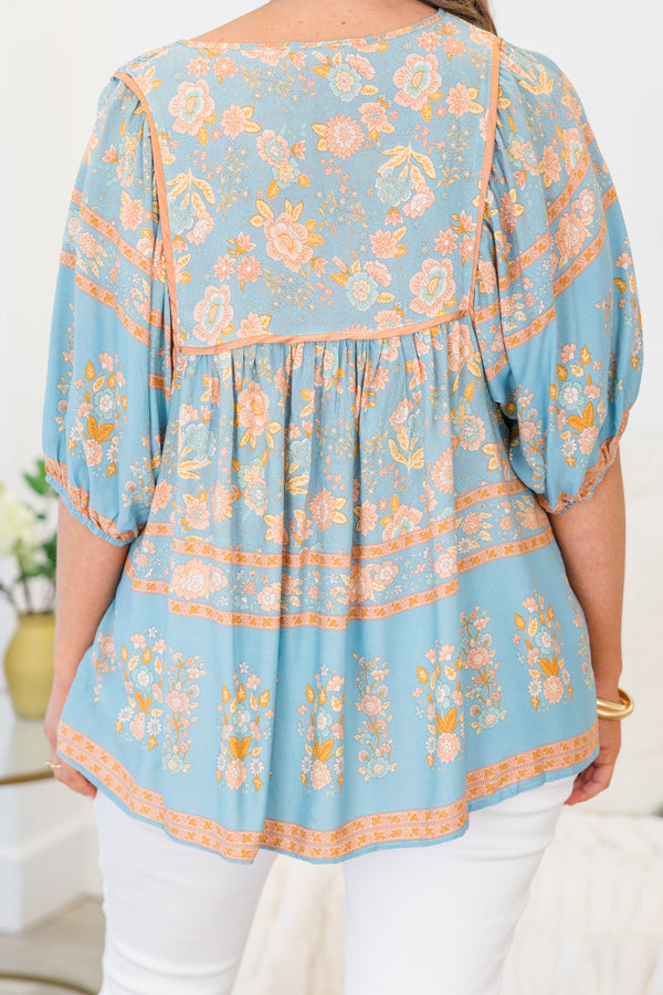 Chic Soul plus size clothing, blue quarter-sleeve top with a split v-neckline and tassels with a blue floral print 