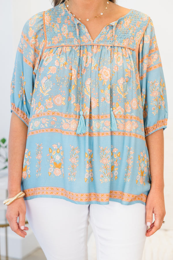 Chic Soul plus size clothing, blue quarter-sleeve top with a split v-neckline and tassels with a blue floral print 