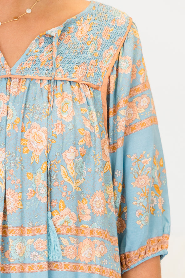 Chic Soul plus size clothing, blue quarter-sleeve top with a split v-neckline and tassels with a blue floral print 
