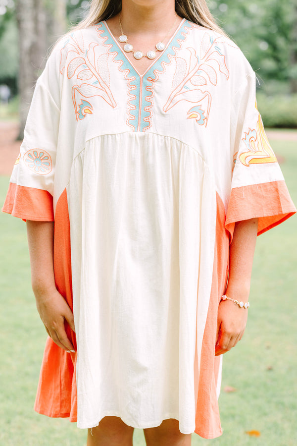 Plus Size cream and orange colorblock midi dress with embroidered V-neckline and wide sleeves.