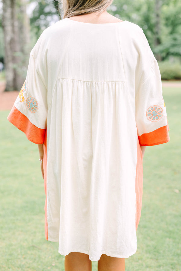 Plus Size cream and orange colorblock midi dress with embroidered V-neckline and wide sleeves.