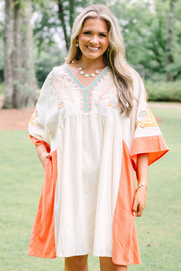 Plus Size cream and orange colorblock midi dress with embroidered V-neckline and wide sleeves.