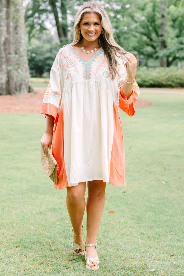 Plus Size cream and orange colorblock midi dress with embroidered V-neckline and wide sleeves.