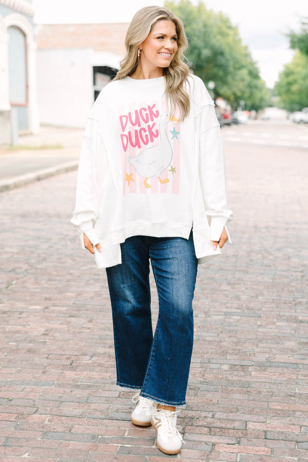 Plus Size ivory crew neck sweatshirt with a pink striped duck graphic and oversized fit.