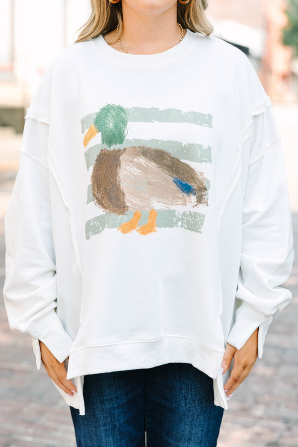 Plus Size ivory crewneck sweatshirt with a painted mallard duck graphic and ribbed cuffs.