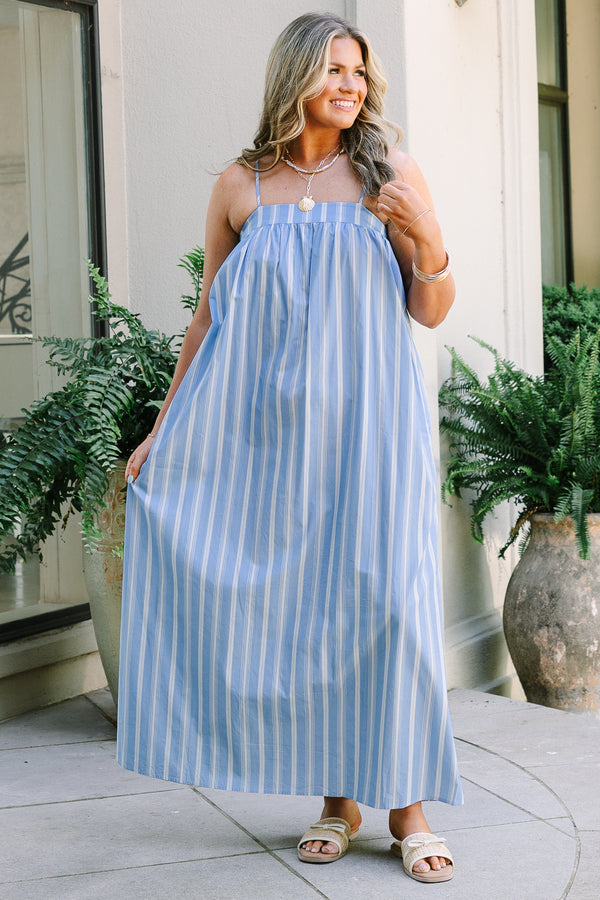 Plus Size light blue and white vertical striped maxi dress with thin straps and a square neckline.