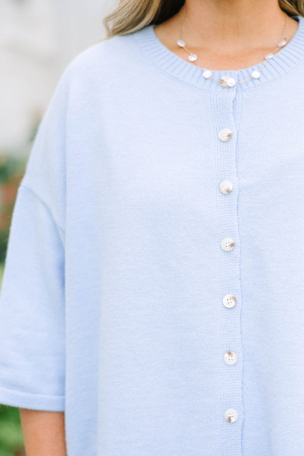 Plus Size light blue oversized cardigan with short sleeves and pearl button-down front.