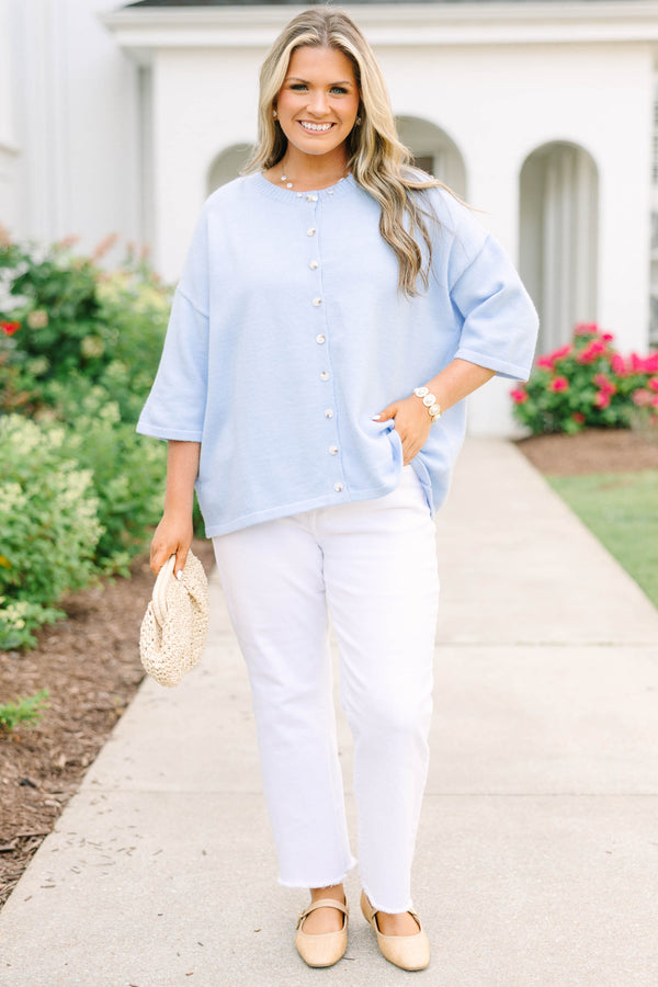 Plus Size light blue oversized cardigan with short sleeves and pearl button-down front.