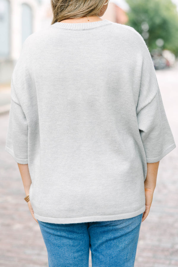 Plus Size heather gray knit cardigan with a round neckline, button-down front, and 3/4 sleeves.