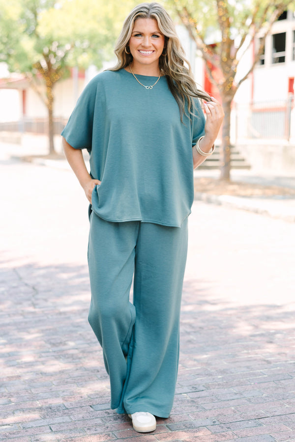 Plus Size ash jade two-piece set featuring a short sleeve crewneck top and wide-leg pants.