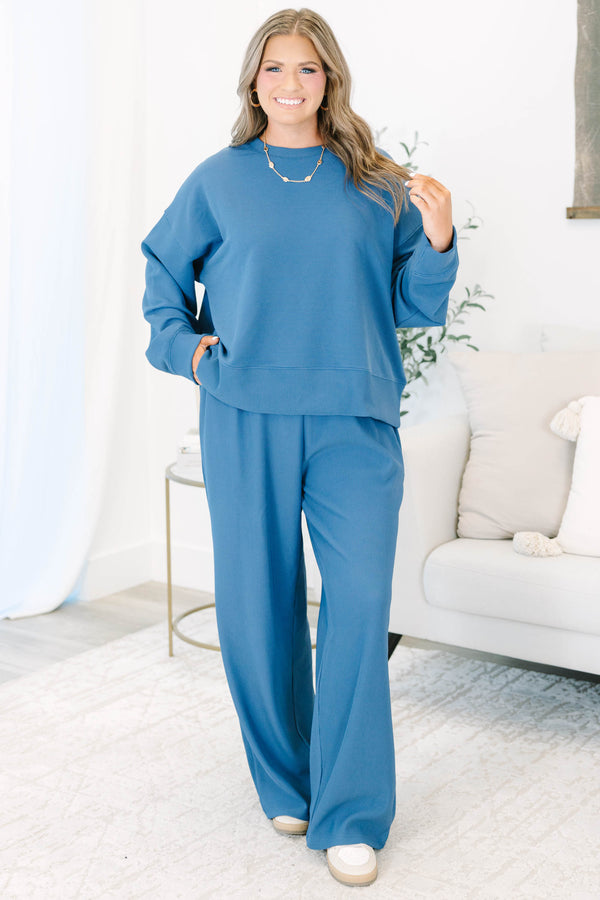 Plus Size slate blue ribbed loungewear set with a long sleeve crewneck top and wide-leg pants.