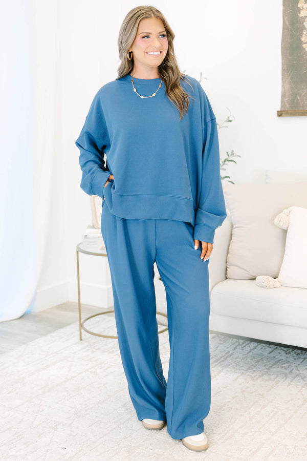 Plus Size slate blue ribbed loungewear set with a long sleeve crewneck top and wide-leg pants.