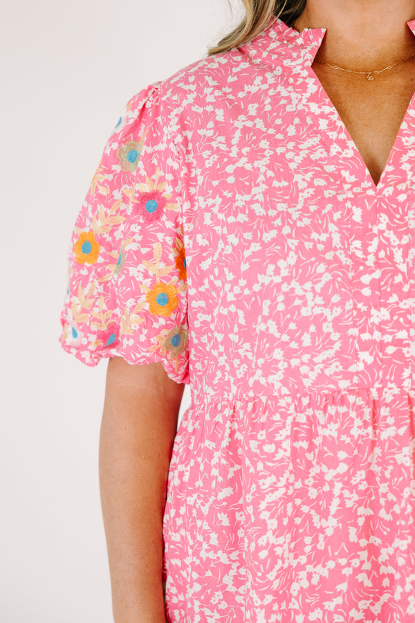 Chic Soul plus size clothing, pink knee length dress with bubble sleeves that have a multi color floral pattern throughout as well as a floral pattern throughout the dress and a slight v-neckline