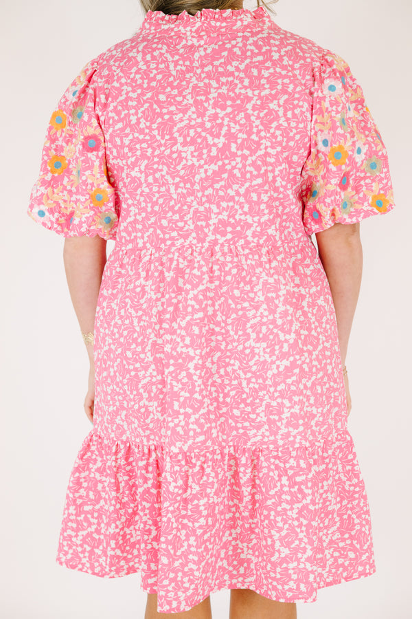 Chic Soul plus size clothing, pink knee length dress with bubble sleeves that have a multi color floral pattern throughout as well as a floral pattern throughout the dress and a slight v-neckline