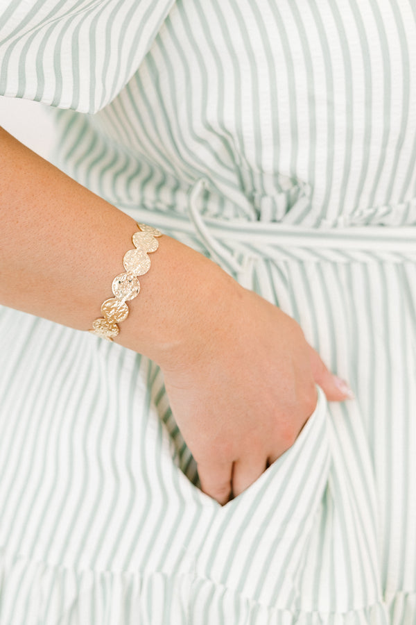 Chic Soul Plus size clothing, Gold bracelet that it made up of textured circle shapes that are connected together to form a bangle 
