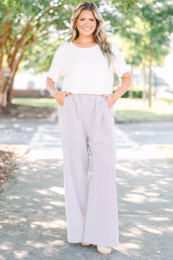 Plus Size wide-leg pants in a brown and white vertical stripe pattern with an elastic waistband.