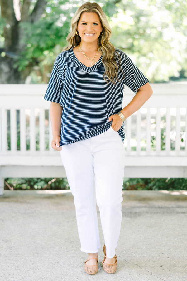 Plus Size navy and white horizontal striped V-neck top with short sleeves and a relaxed fit.