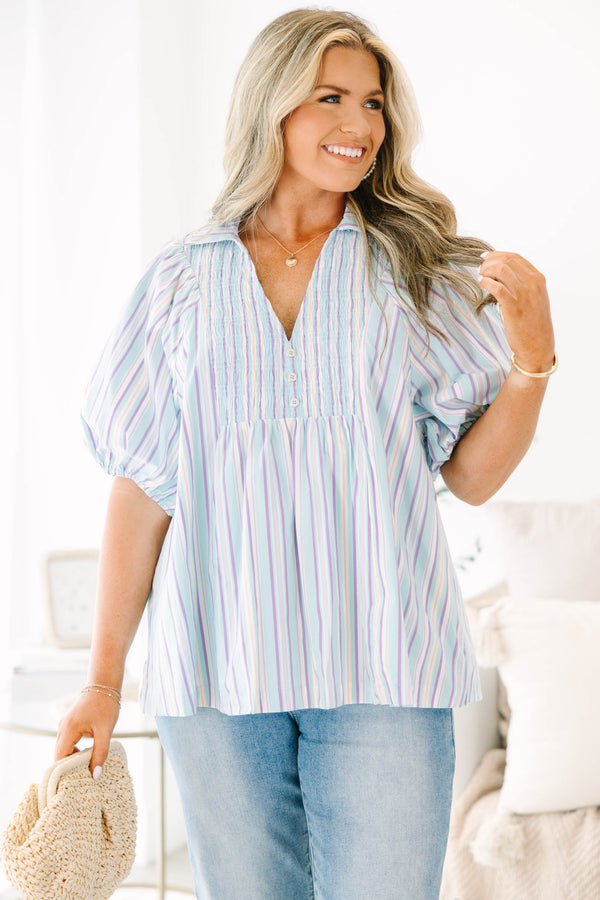 Plus Size blue striped top with a v-neck, collar, smocked front, and short bubble sleeves.