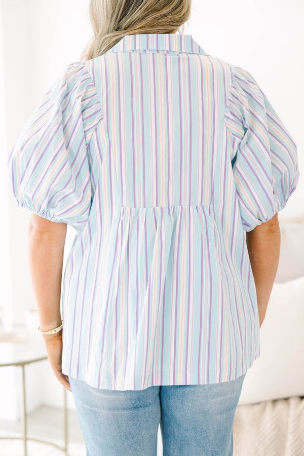 Plus Size blue striped top with a v-neck, collar, smocked front, and short bubble sleeves.