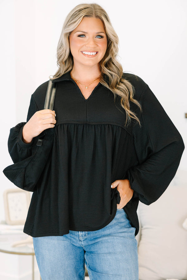 Plus size black Enchanting Days Top with a flowy fit, ribbed texture, and long balloon sleeves.